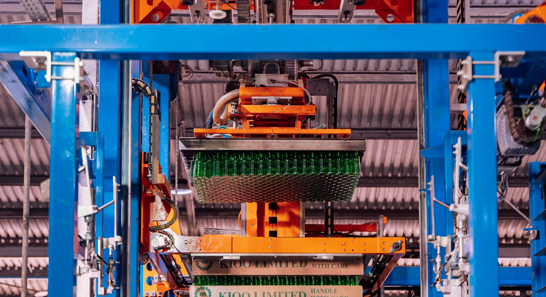 An automated storage and retrieval system moving crates inside a distribution centre